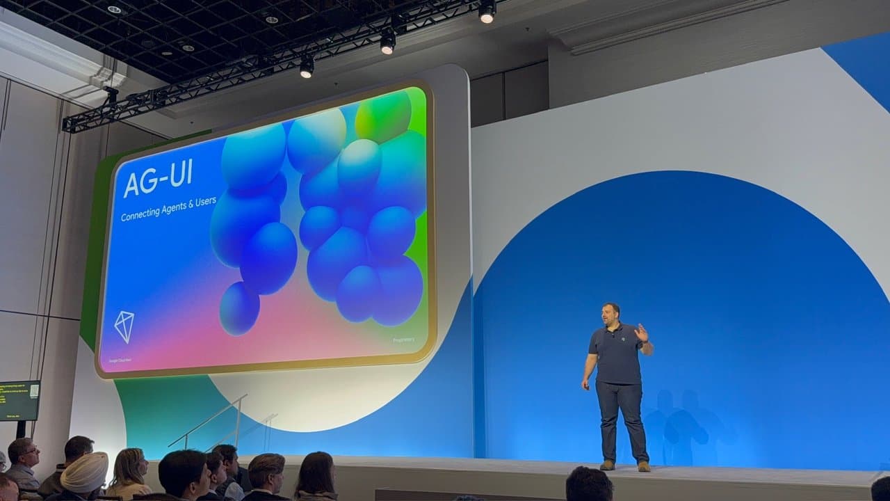 Atai Barkai on stage at Google Cloud Next in front of an AG-UI: Connecting Agents and Users slide